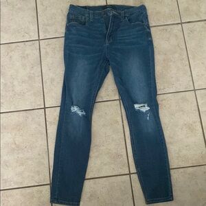 Blue Straight Leg Jeans with Distressed Details